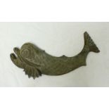 A large cast bronze or brass fish, as used on various Royal Navy insignia, reputably taken from