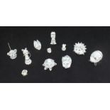 Eleven assorted miniature Swarovski animals, including a swan, a hedgehog and an elephant etc.