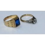 An unmarked gent's gold ring set with blue stone, unmarked but tests as probably 18ct), together