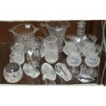 A quantity of assorted cut glass items including thistle shaped glasses, a decanter, an ice bucket