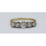 An 18ct yellow gold five-stone diamond ring, claw-set graduated RBC diamonds, estimated total