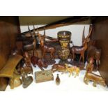 SECTION 9. A collection of African carved hardwood animal and tribal figures, together with a number