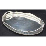 A large silver-plated oval galleried tray. 57cm long.