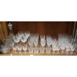 A good quantity of assorted cut glass items, including a Waterford decanter and a set of six wine