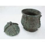 A Shang dynasty style patinated bronze ritual vessel, the underside of lid baring character marks