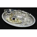 An oval silver-plated tray with pierced gallery, together with a 3-piece Walker & Hall tea set, a