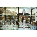 An assortment of mixed glassware, including six decanters, a gilded four-piece lemonade set and wine