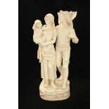 A large 19th century Continental pottery figure-group depicting an oyster catcher with a lady and