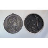 A bronze relief cast plaque depicting classical figures, together with a bronze plaque decorated