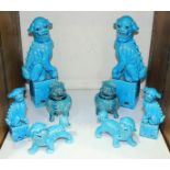 SECTION 26. A collection of eight various blue-glazed Chinese fo dogs.