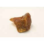 A large unpolished fragment of amber, 423 grams