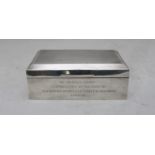 A silver cigarette box, the hinged top opening enclosing two compartments. Gross weight