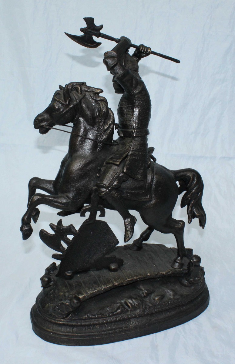 A cast iron figure of a warrior on horseback, possibly a Saxon. 51cm high. - Image 2 of 2