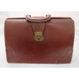 A vintage brown leather briefcase.