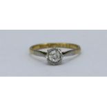 An 18ct yellow gold and platinum solitaire diamond ring, claw-set a Victorian cushion-cut diamond,