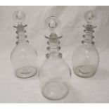 A set of three Georgian 'style' glass decanters, the neck of each decorated with three graduated