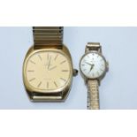 A 9ct gold cased ladies Omega wristwatch on expanding bracelet, together with a gents gold-plated