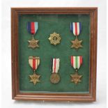 A framed WW2 medal-group, comprising of The War star, France and Germany Star, Italy star, Africa