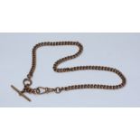 A 9ct rose gold Albert watch chain with T-bar. Gross weight approximately 38.4g.