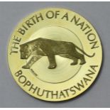 An 18ct gold 'Bophuthatswana Independence Medallion.' Issue number 1145. Gross weight