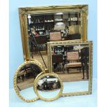 Four various gilt framed mirrors, the largest measuring 107 x 75cm.