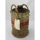 A partially-full Royal Navy issue one-gallon stoneware bottle of Pusser's Rum, retaining the