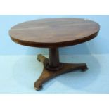 A 19th century circular walnut tilt-top supper table, raised on plain tapering column to concave