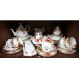 SECTION 33. A part Royal Albert 'Old Country Roses' tea and dinner service comprising teapot, dinner