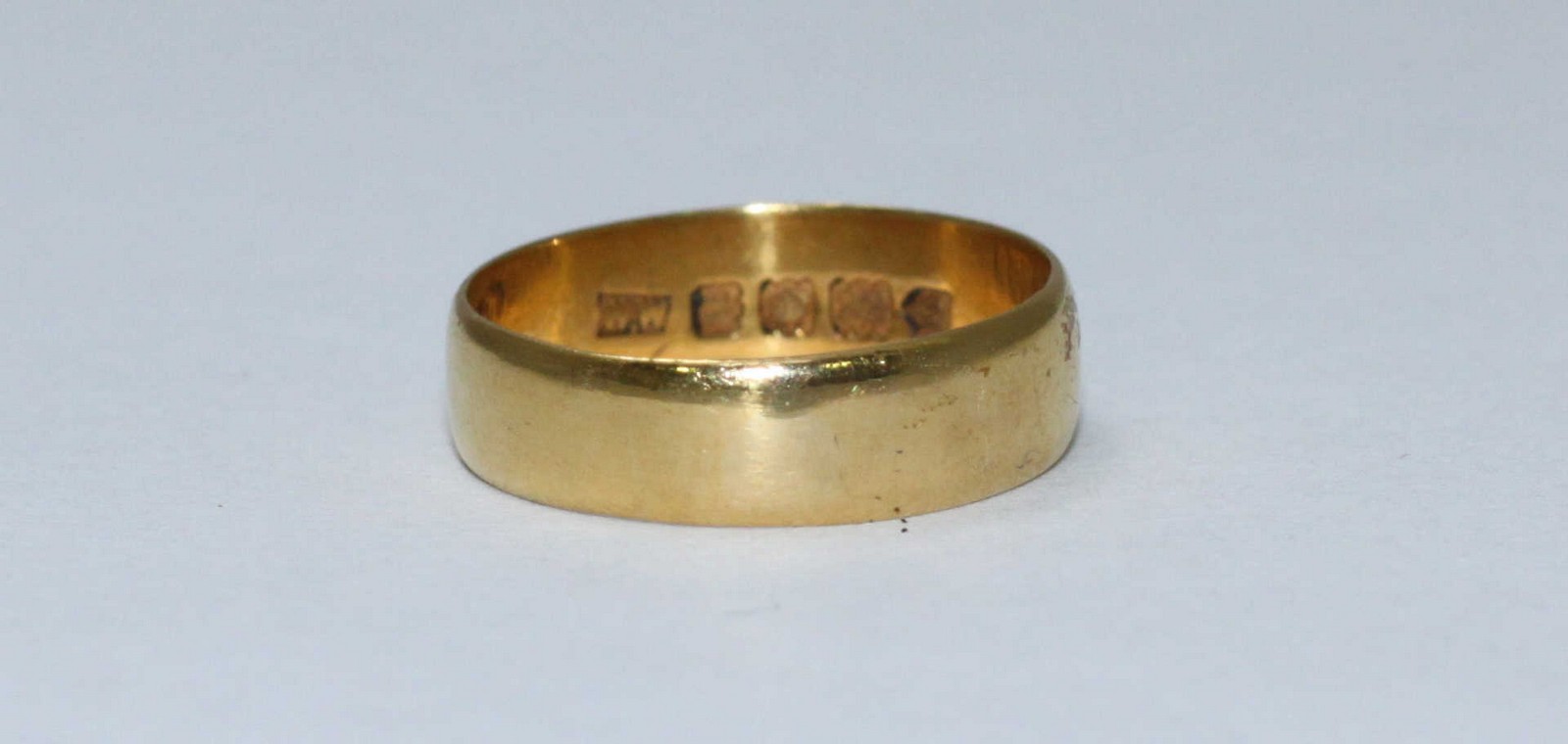 A 22ct gold plain wedding band. Gross weight approximately 3.0g
