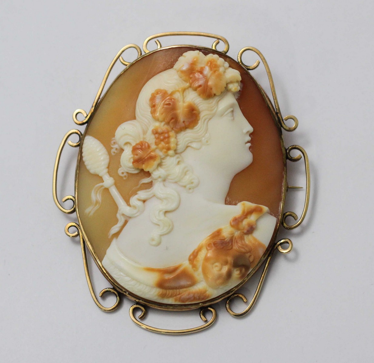 A nice quality Italian shell-carved cameo brooch depicting a female follower of Bacchus, God of