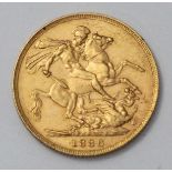 An 1886 22ct gold full sovereign.