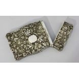 A Victorian silver card-case by Joseph Willmore, of rectangular form with hinged cover, finely