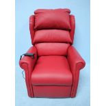 A red leather upholstered, remote control operated reclining chair. 116cm high. (Chair cost £4000