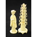 An early 20th Japanese carved Ivory Geisha figure, 12cm high, together with a carved Ivory pagoda,