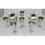 A set of six EPNS engraved goblets, together with a pair of silver-plated globular wine or water