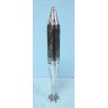 A stainless steel or chrome parachute launch rocket (deactivated) round. 66cm high.