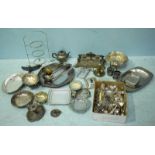 A good quantity of silver-plated wares including trays, a cake stand, candlesticks and a teapot etc.