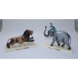 Coalport limited edition Guinness figurines 'Elephant and Keeper' and 'Lion', in original boxes with