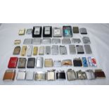 Approximately forty seven various lighters including Zippo, Benson & Hedges, Colibri, Magna, Ronson,