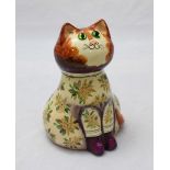 A Joan and David de Bethel papier-mâché figure of a cat dated 1967, with green glass eyes, decorated