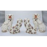 Two pairs of Staffordshire spaniels, largest 26cm high (4)