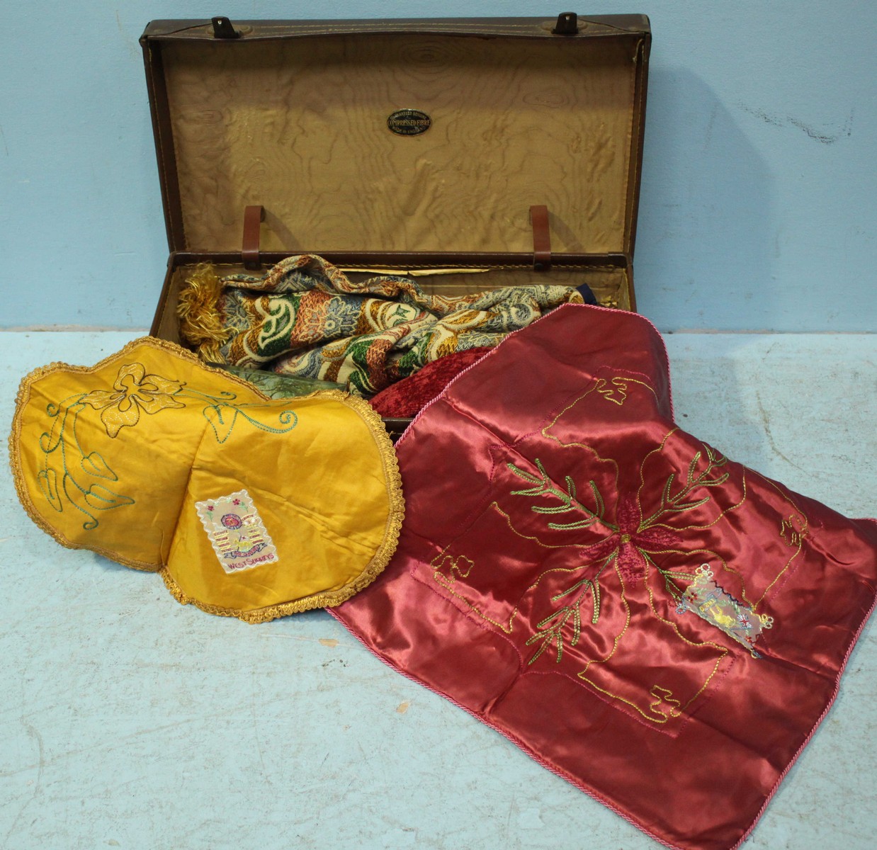 Two WWII satin-embroidered pillow cases worked with Regimental badges, together with a quantity of