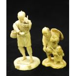 A Japanese Meiji Period Carved Ivory Okimono figure of man and boy, he with hat (glued), the boy