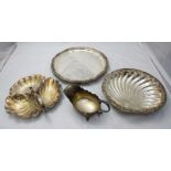 A large silver-plated shell-shaped dish, together with a shell-shaped hors d'oeuvres dish, sauce