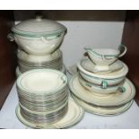 SECTION 11. A Spode Art Deco 'Royal Jasmine' dinner service with banded silver and green