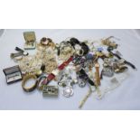 A small quantity of costume jewellery necklaces, brooches, and watches etc