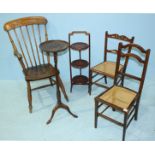 A stained wood armchair and two cane seated standard chairs, together with a folding cake stand
