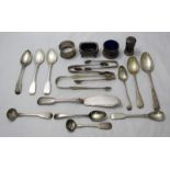 A quantity of assorted silver items including sugar tongs, a napkin ring, various spoons and some