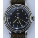 A Smiths W10 manual wind military issue wristwatch, c.1968. The black dial with Arabic numerals,