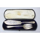 A Victorian silver fish-serving knife and fork, Old English pattern, with pierced blades, London,